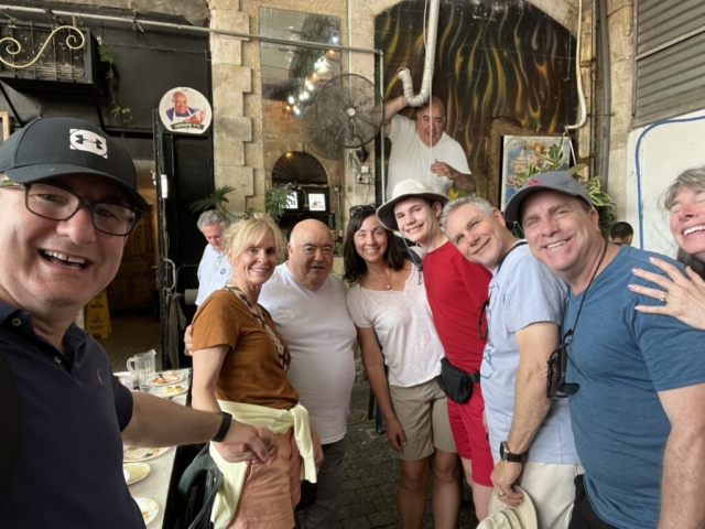 Our group having enjoyed a meal at Dr. Shakshuka's in Tel Aviv